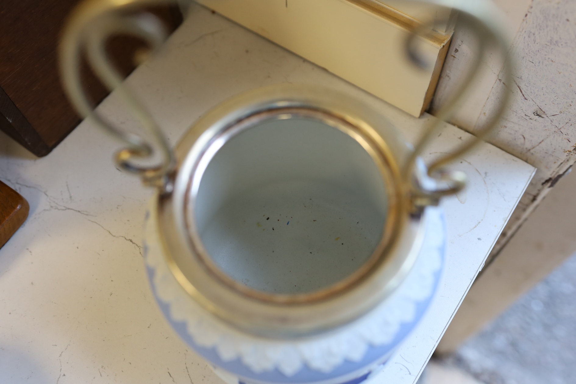 A Wedgwood three colour biscuit barrel with plated rim and handle, a Royal Worcester cup and saucer and a Dresden shaped bowl, biscuit barrel 17cm high. Condition - good